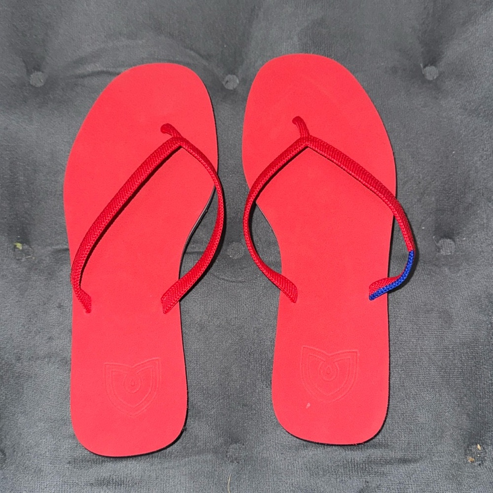 Never worn red Rothy’s Flip Flops